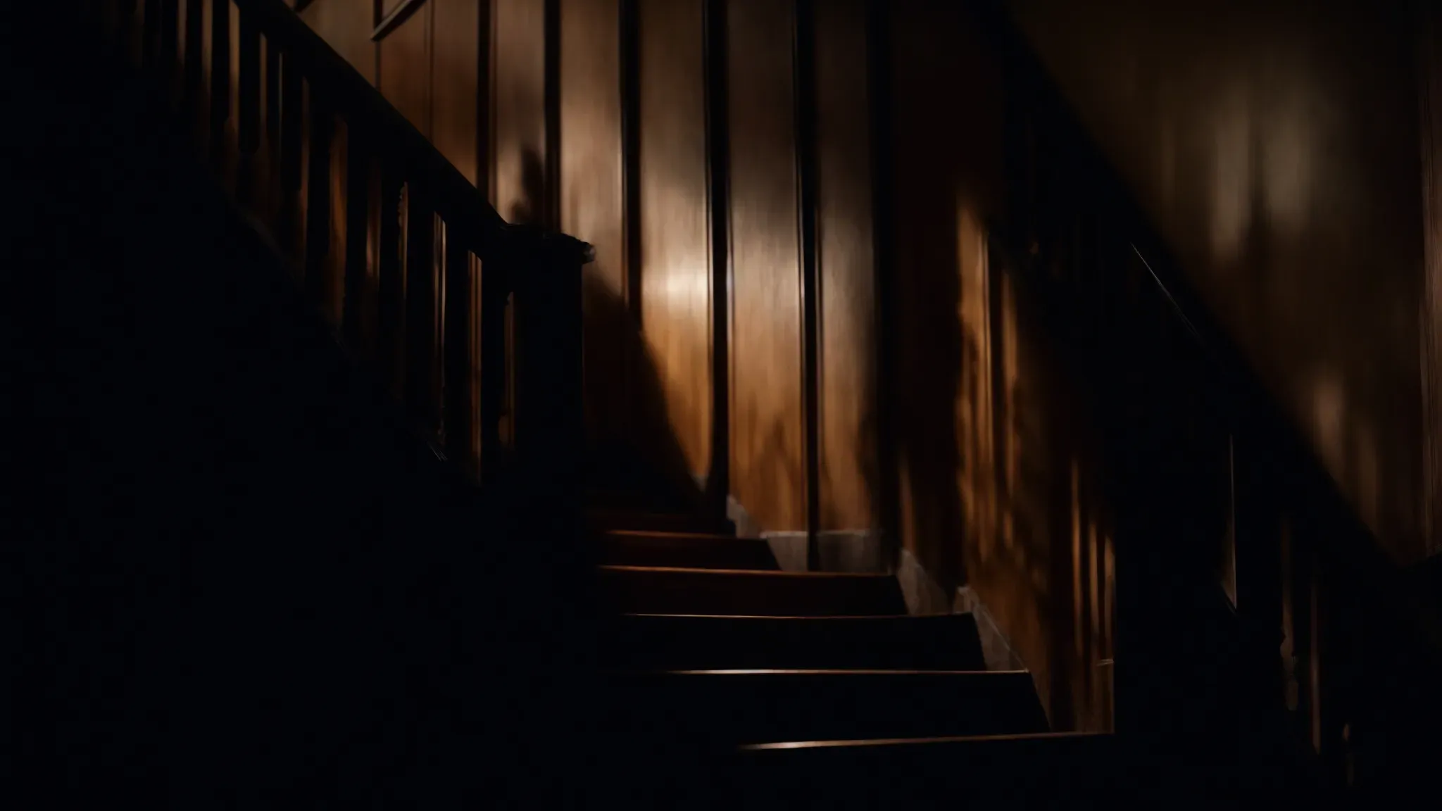 a shadowy figure looms at the top of a dimly lit staircase, capturing the ominous essence of a hitchcockian thriller.