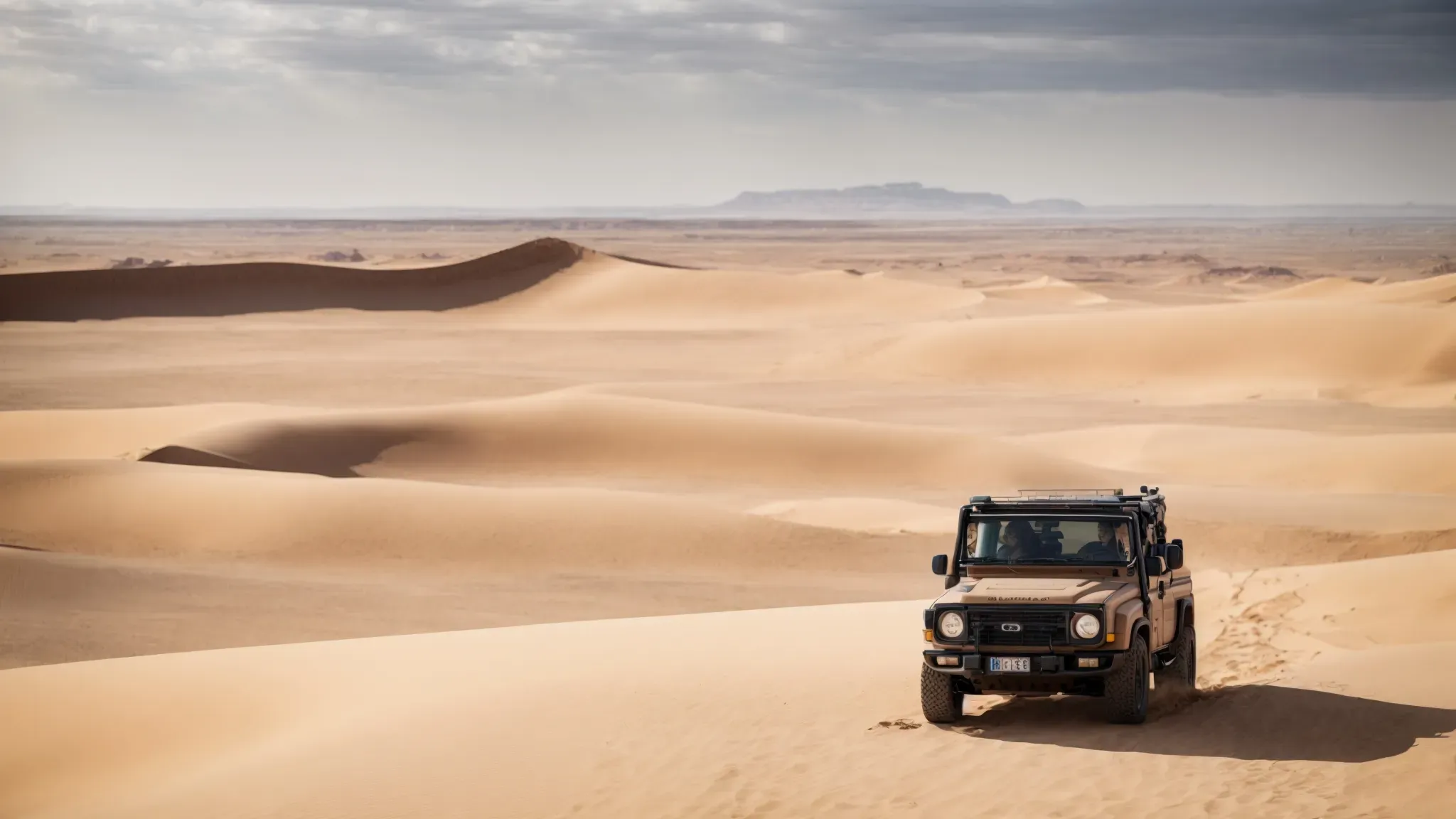 a panoramic view of a vast, desolate desert with a lone traveler in the distance, highlighting the overwhelming scale and isolation of the landscape.