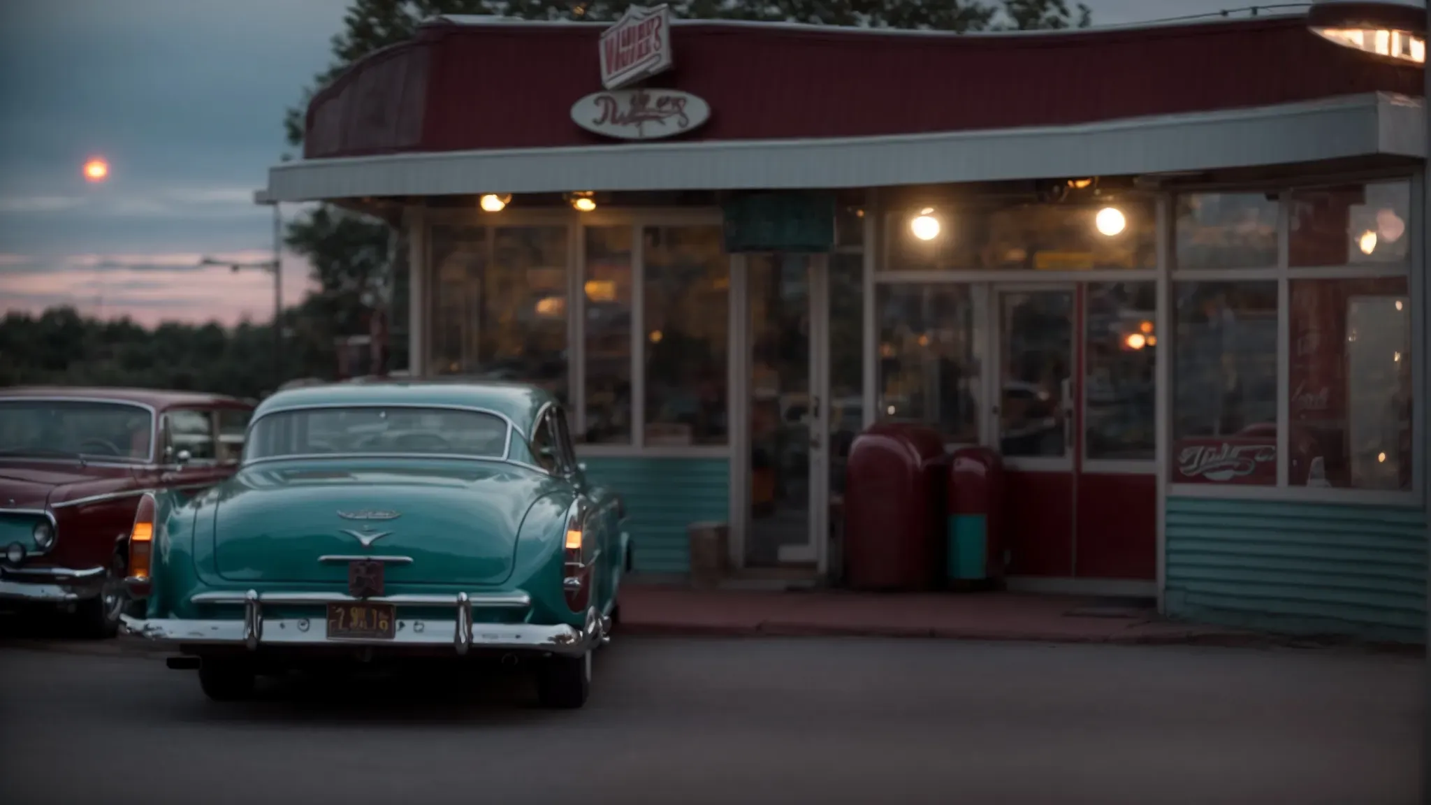 a vintage car parked outside an old diner at dusk, hinting at a bygone era.