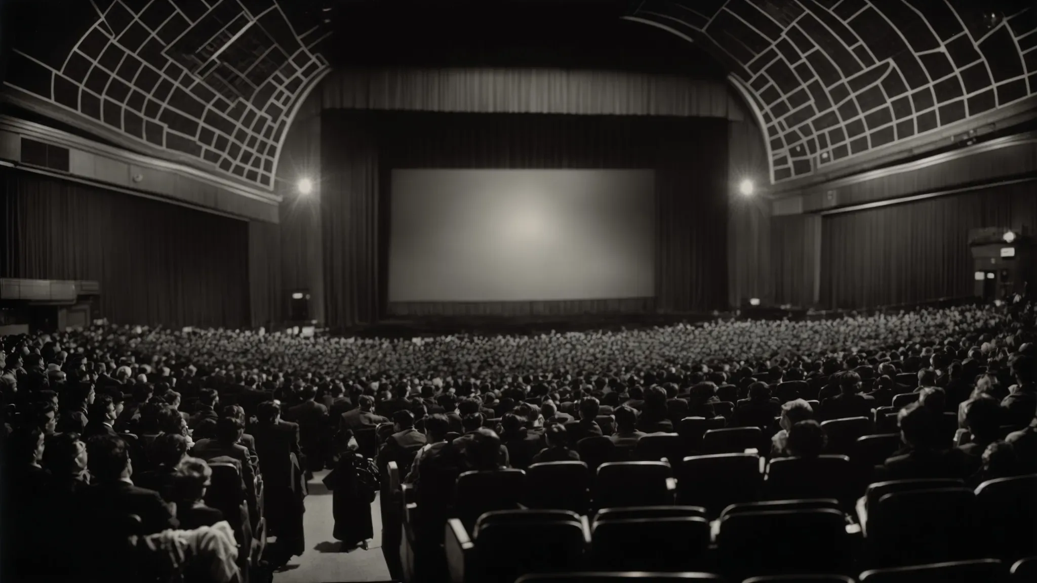 a packed movie theater from the 1960s with a large, classic film projector casting a dramatic movie scene onto the big screen.