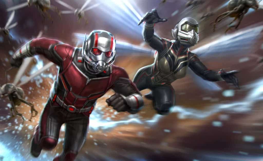 a person sits in a movie theater, their eyes wide with awe as the screen illuminates their face with scenes from 'ant-man and the wasp: quantumania.'